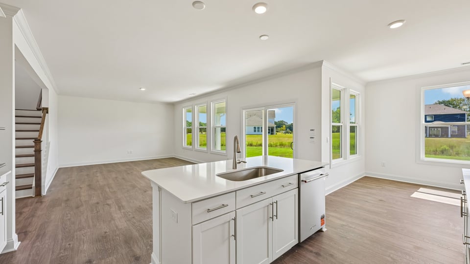 kitchen overlooking spacious living room