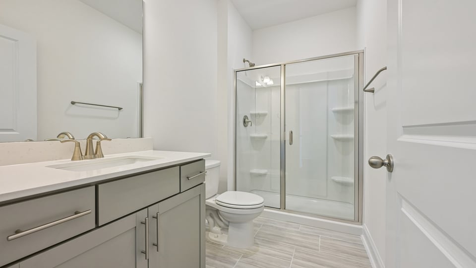 first floor full bathroom with walkin shower