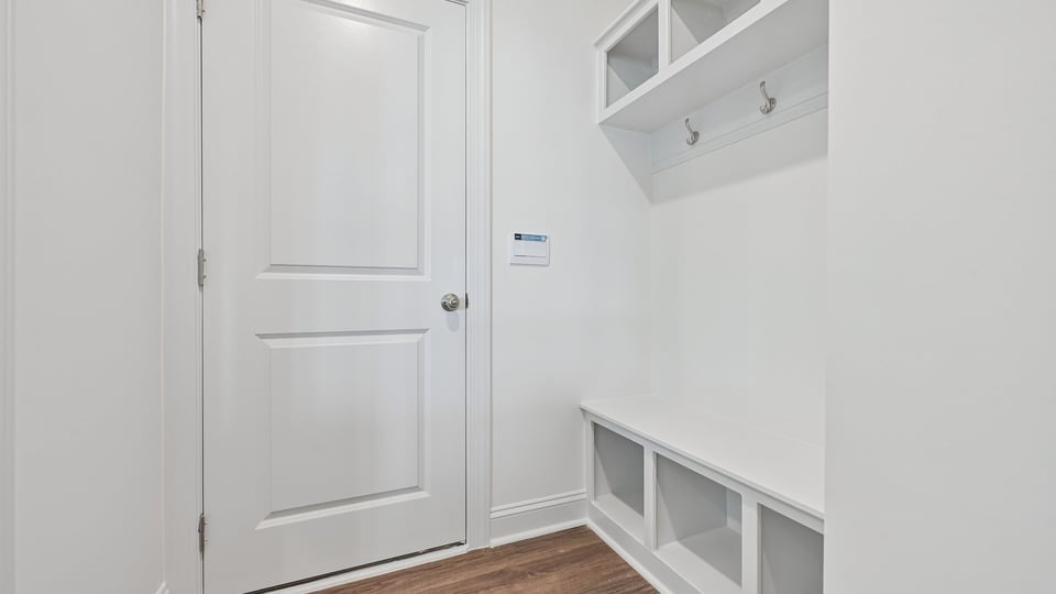 garage entry with dropzone mudbench with cubbies