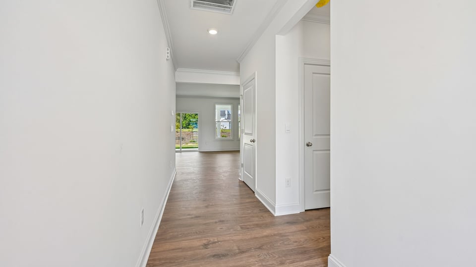 foyer entryway with revwood flooring