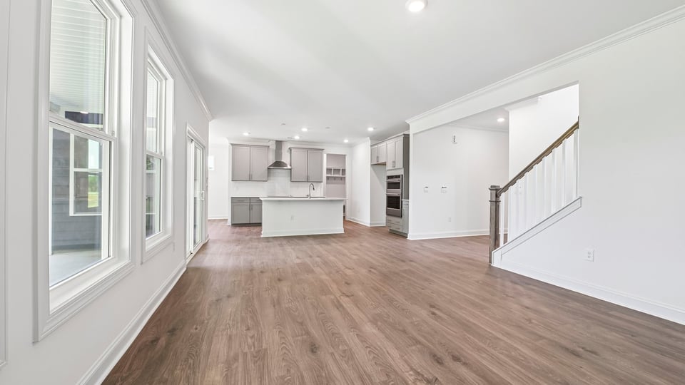 open living room overlooked by kitchen