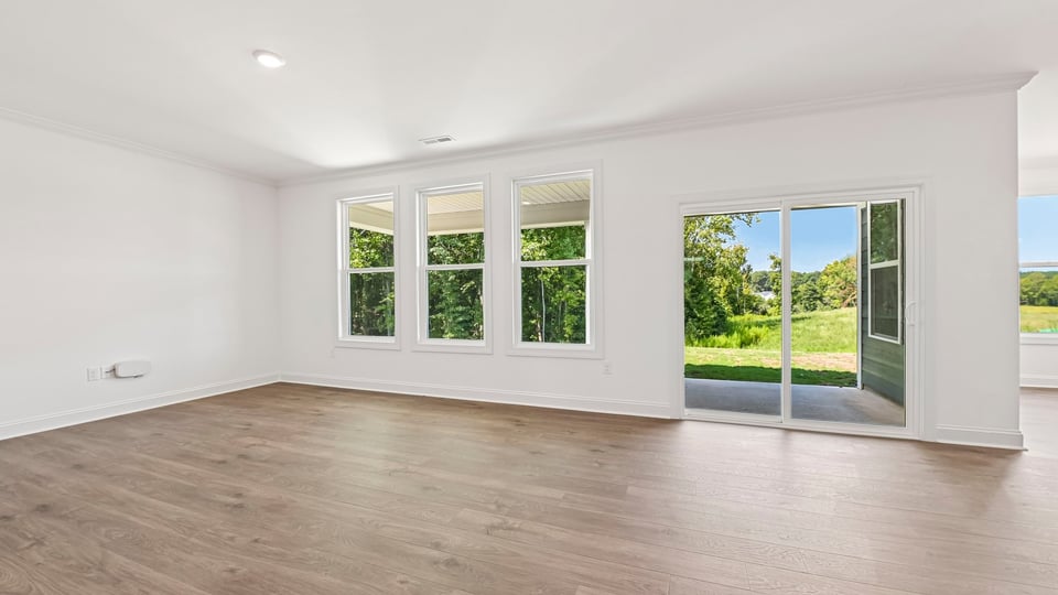 living room with revwood flooring