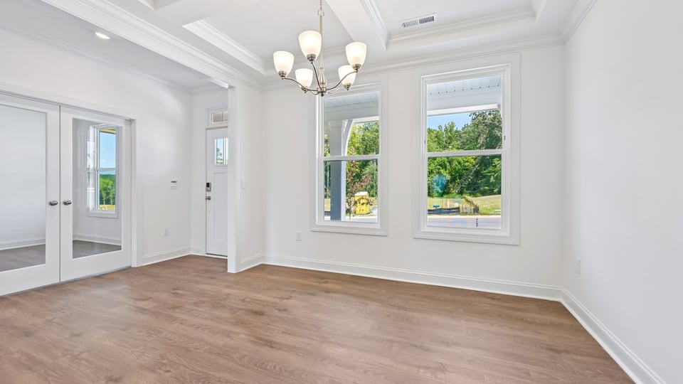 dining room with coffered ceiling