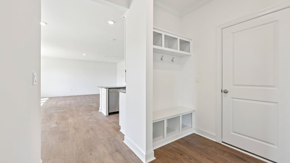 garage entry door with mudbench dropzone with cubbies
