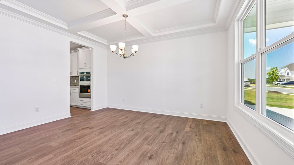 dining room with coffered ceiling