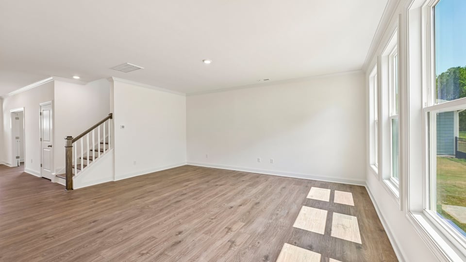 living room with revwood flooring
