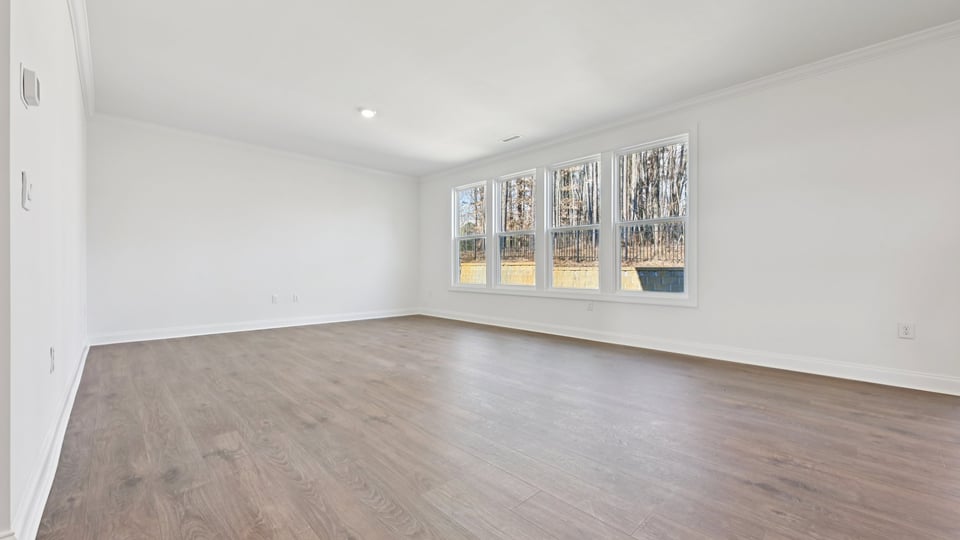 open concept living space with large windows