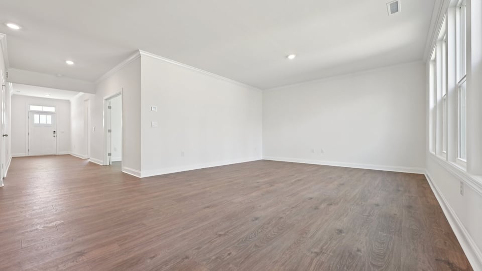 open concept living space with large windows