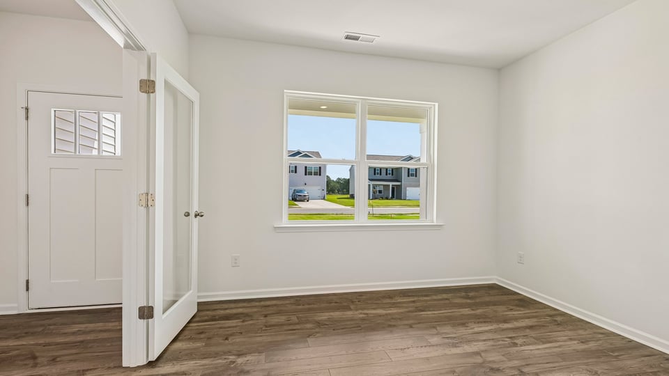 foyer and study with revwood flooring and french doors