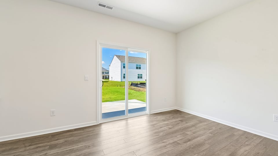 DINING AREA AND REAR PATIO DOORS
