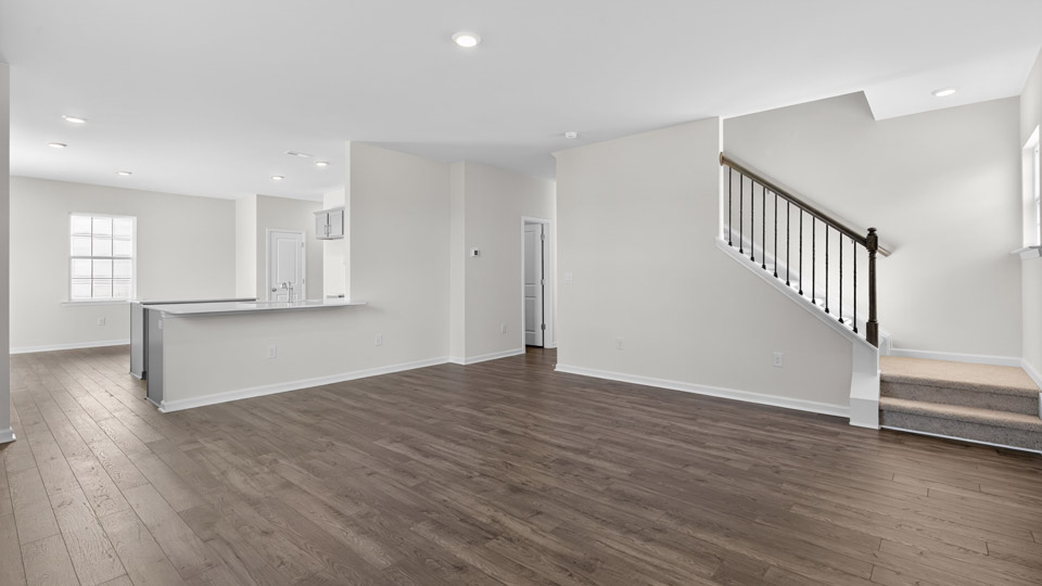 open concept living space with large windows