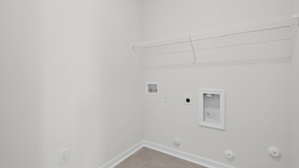laundry room with wire shelving