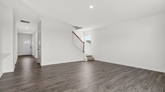 open concept living space with large windows