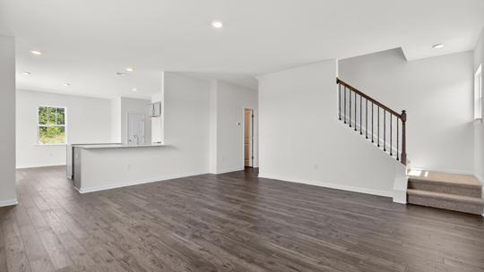open concept living space with large windows