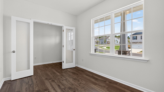 flex room with large windows, french doors