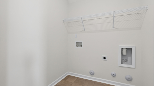 laundry room with wire shelving