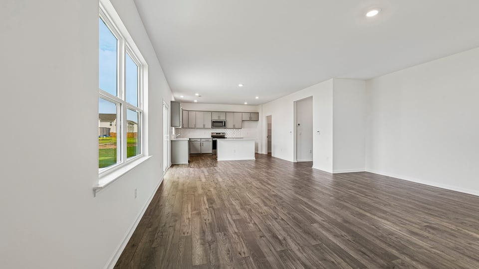 open concept living and dining areas