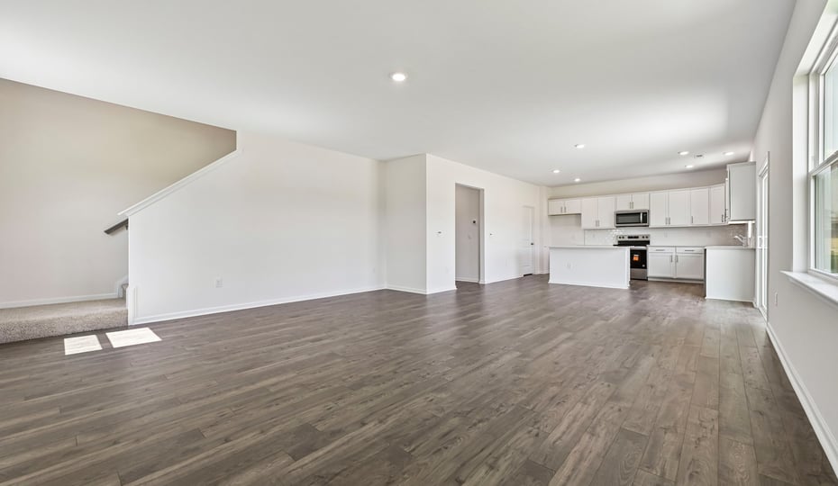 kitchen overlooking dining and living areas