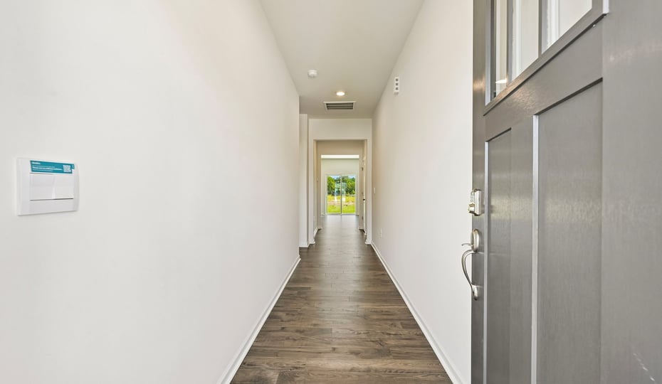 foyer entryway with revwood flooring