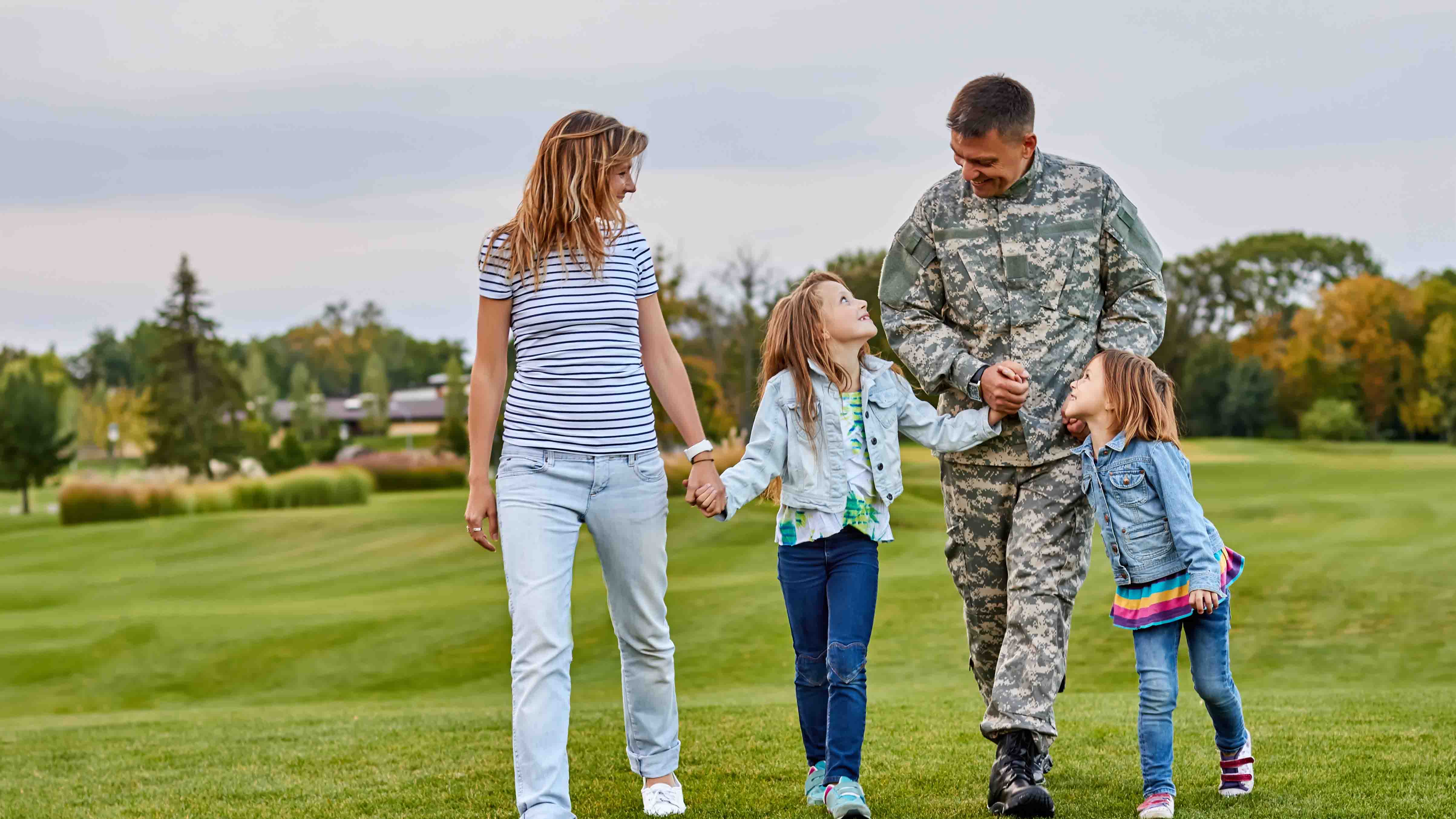 military family walking outside