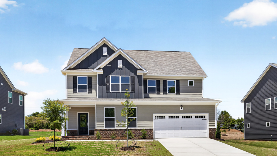 Lucas H front exterior with two car garage