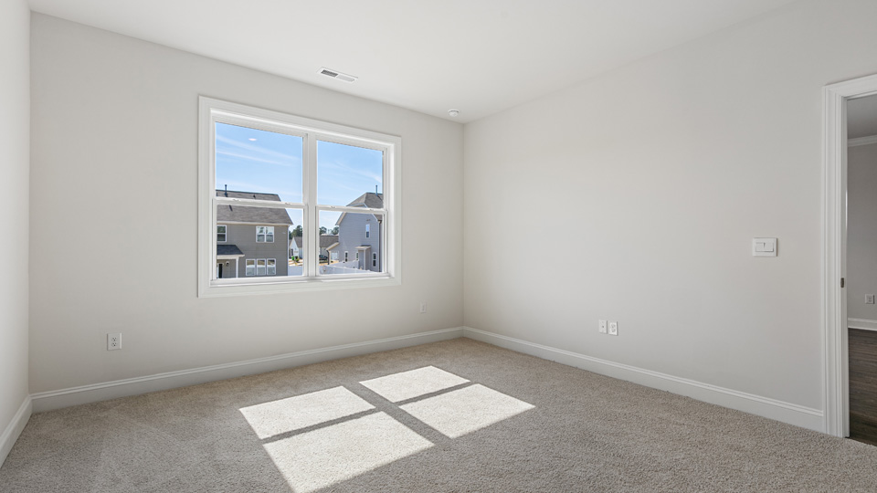 Bedroom with carpet