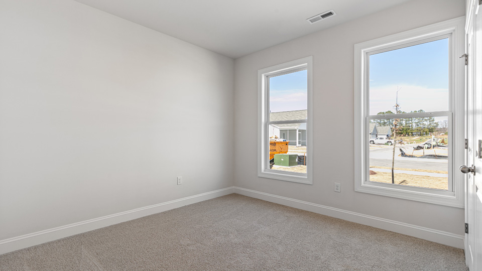 Bedroom with carpet flooring