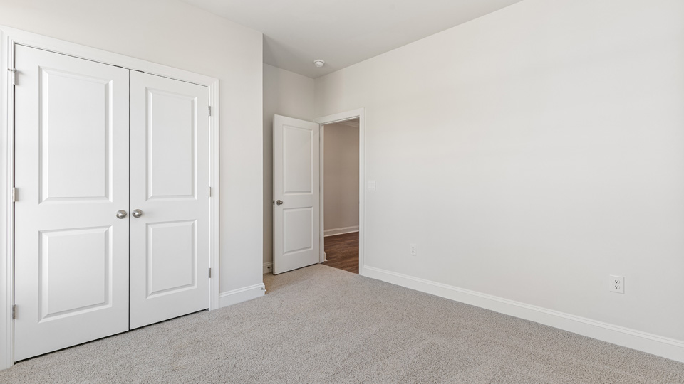 Bedroom with carpet flooring