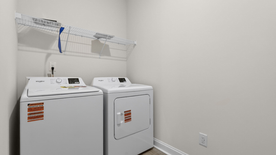 laundry room with wire shelving