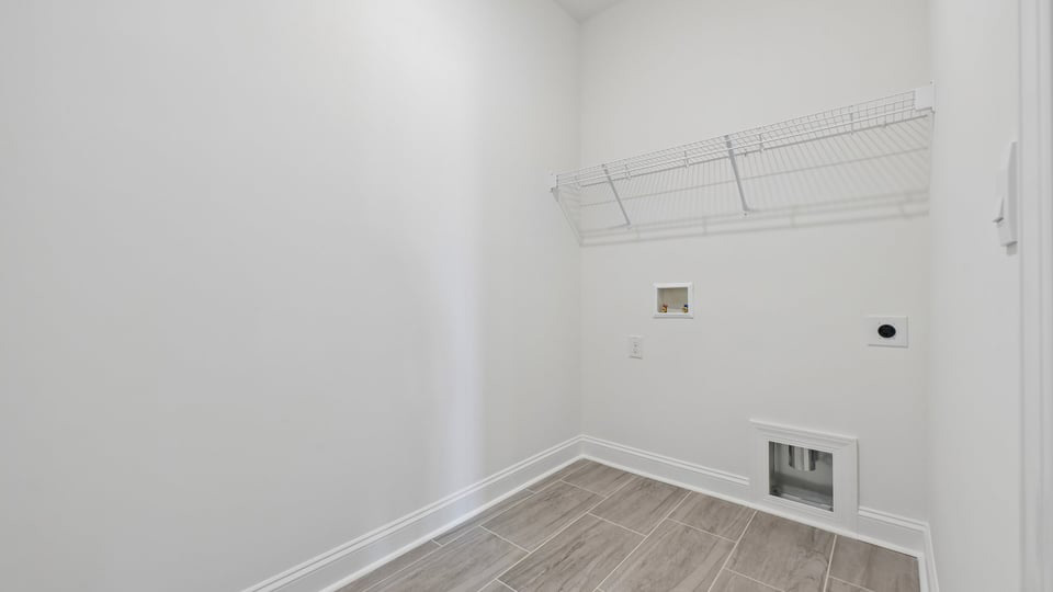 laundry room with wire shelving