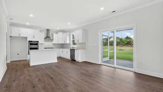 dining area and kitchen with sliding glass doors to patio
