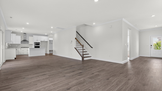 living room with revwood flooring