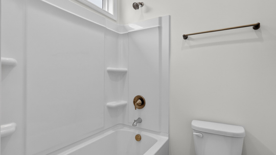 bathroom with tub shower combo