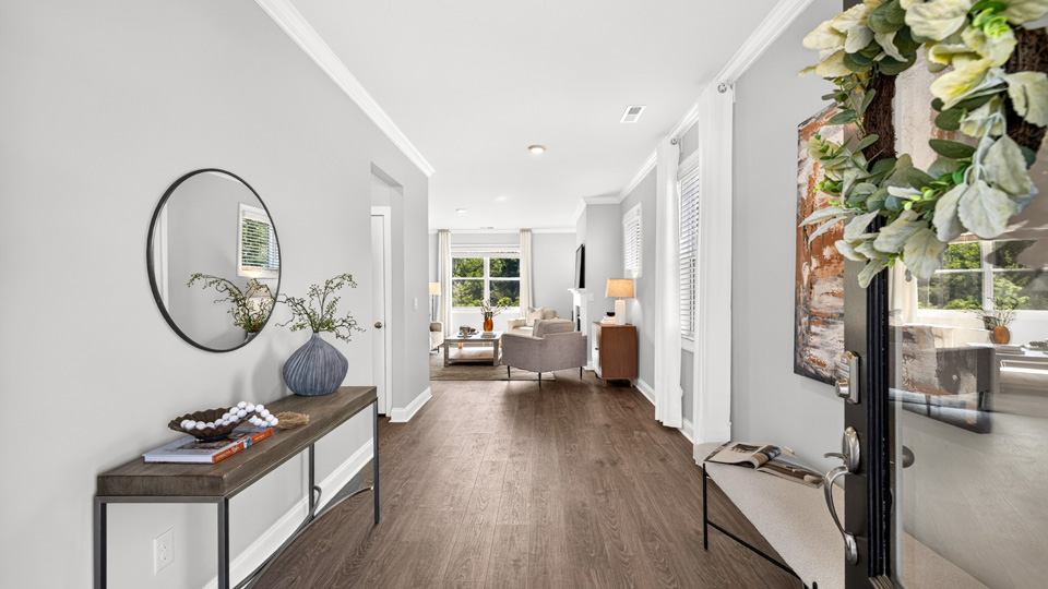 foyer entryway with revwood flooring
