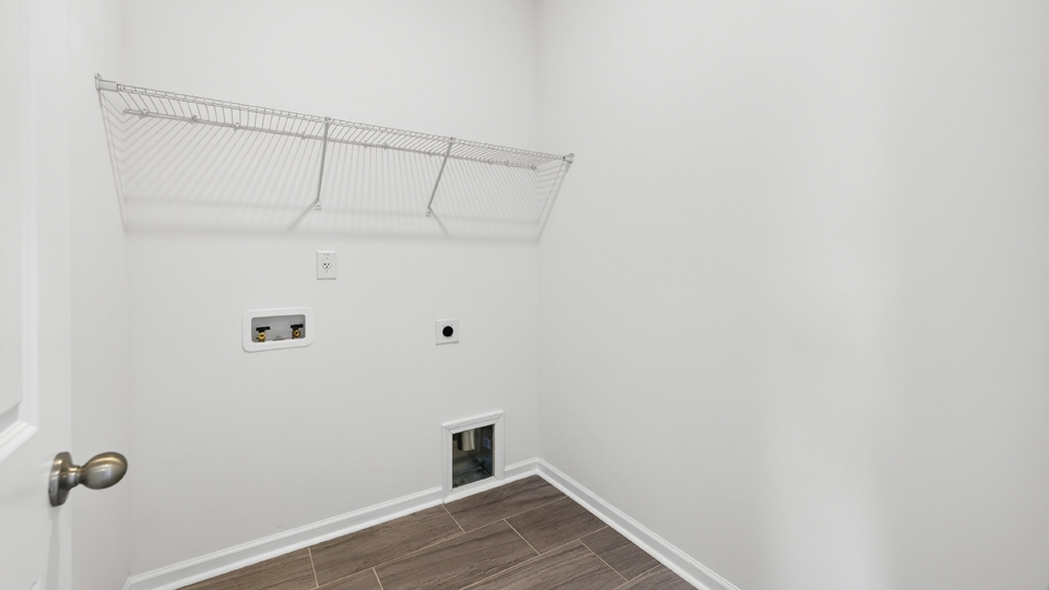 laundry room with wire shelving