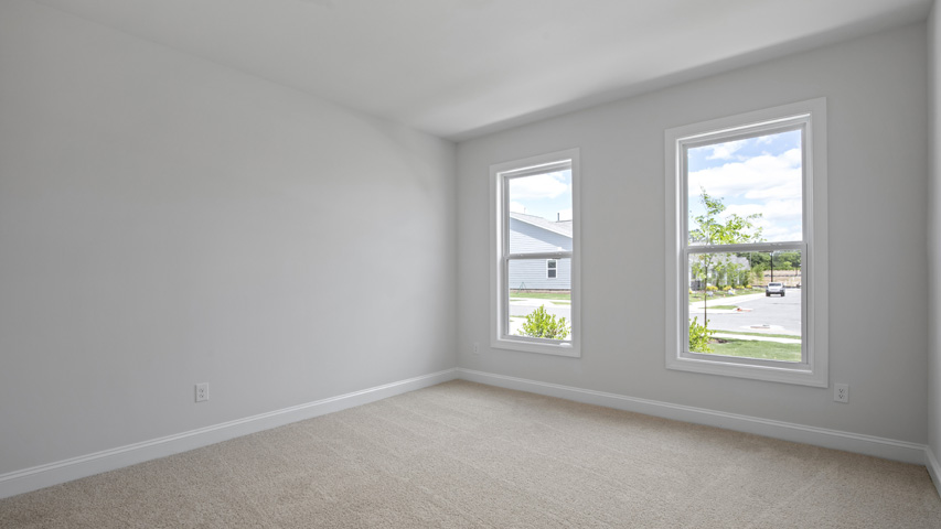 Bedroom with carpet flooring