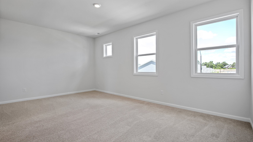 Bedroom with carpet flooring