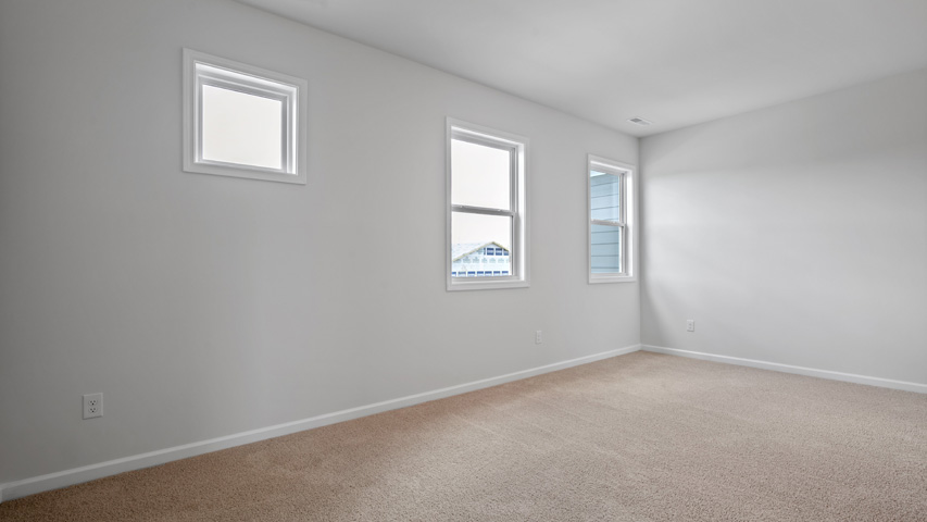 Bedroom with carpet flooring