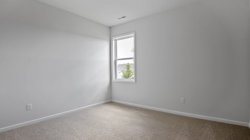 Bedroom with carpet flooring