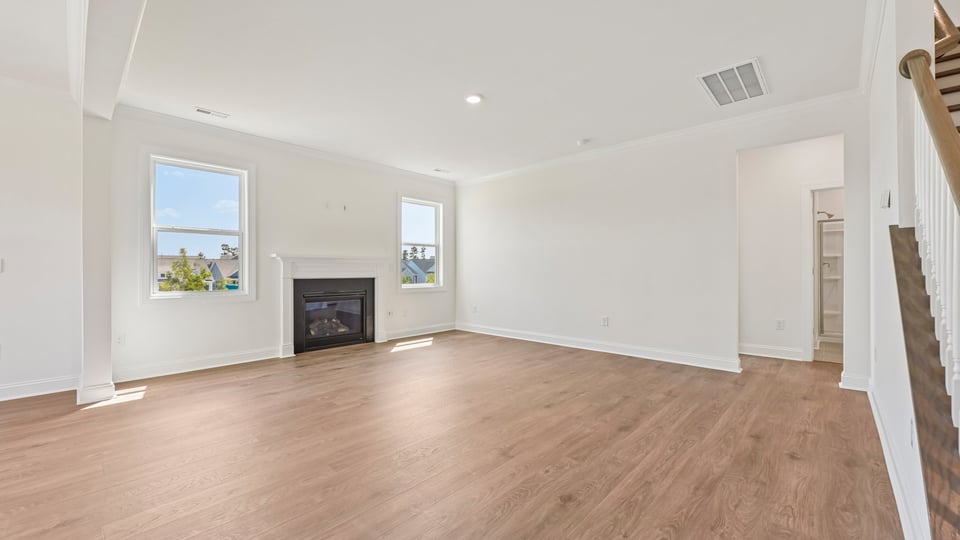 open concept living room with fireplace