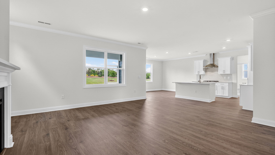 living room with revwood flooring