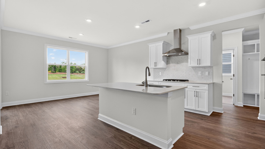 kitchen with island white cabinets quartz countertops