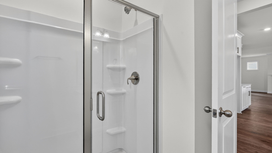 bathroom with glass door walkin shower