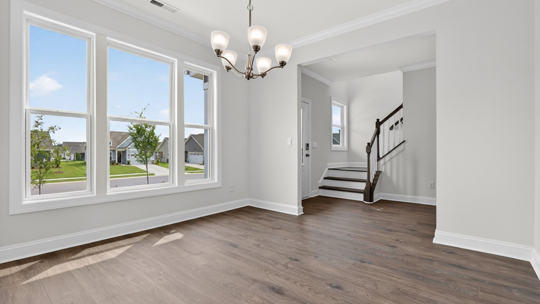 dining room with revwood flooring