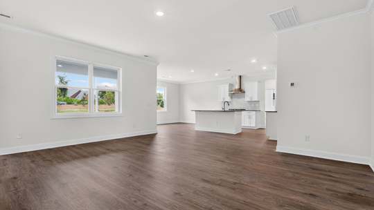 living room with revwood flooring