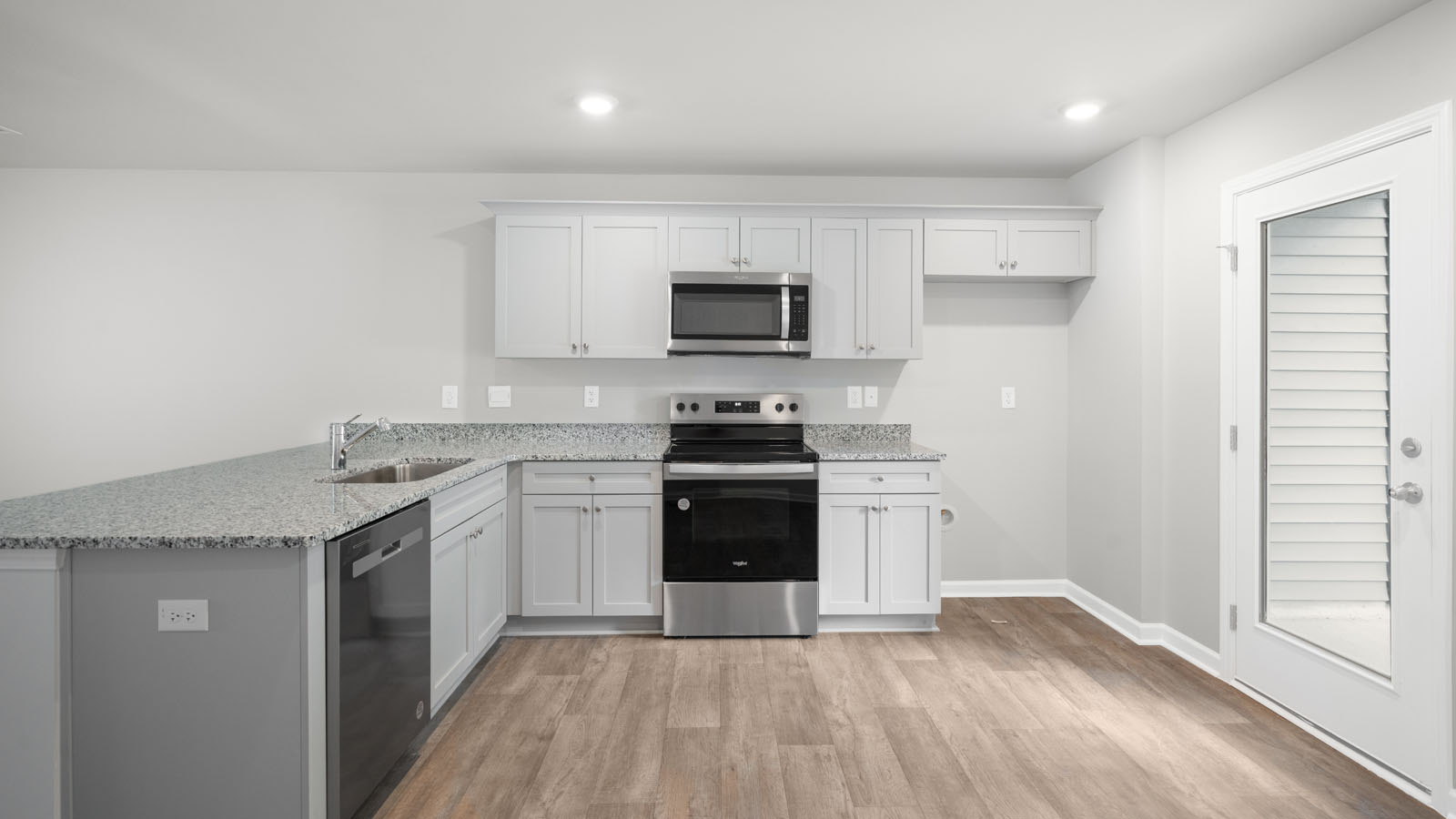 Kitchen with white cabinets