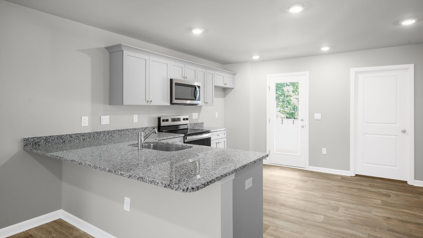 Kitchen with white cabinets