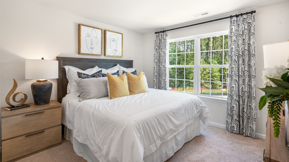 bedroom with carpet and ample light