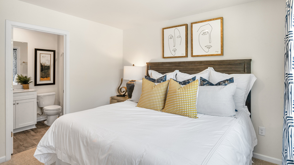 bedroom with carpet and ample light