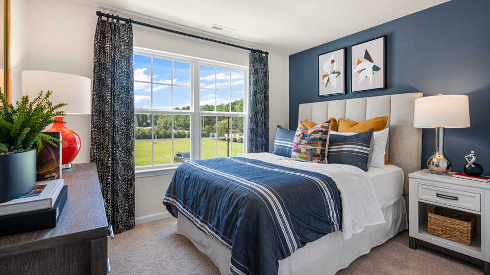 bedroom with carpet and ample light